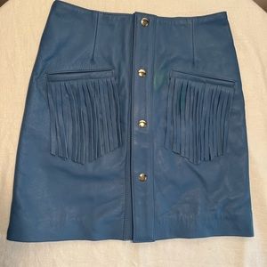 NWT Understated by FREE PEOPLE. Women’s size small, blue leather mini skirt